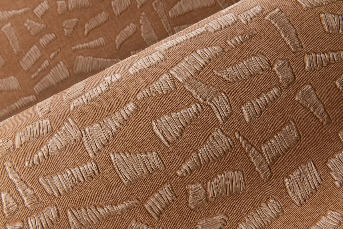 Kona in een interieur, kleur Desert Dream — niet de kleur van dit product